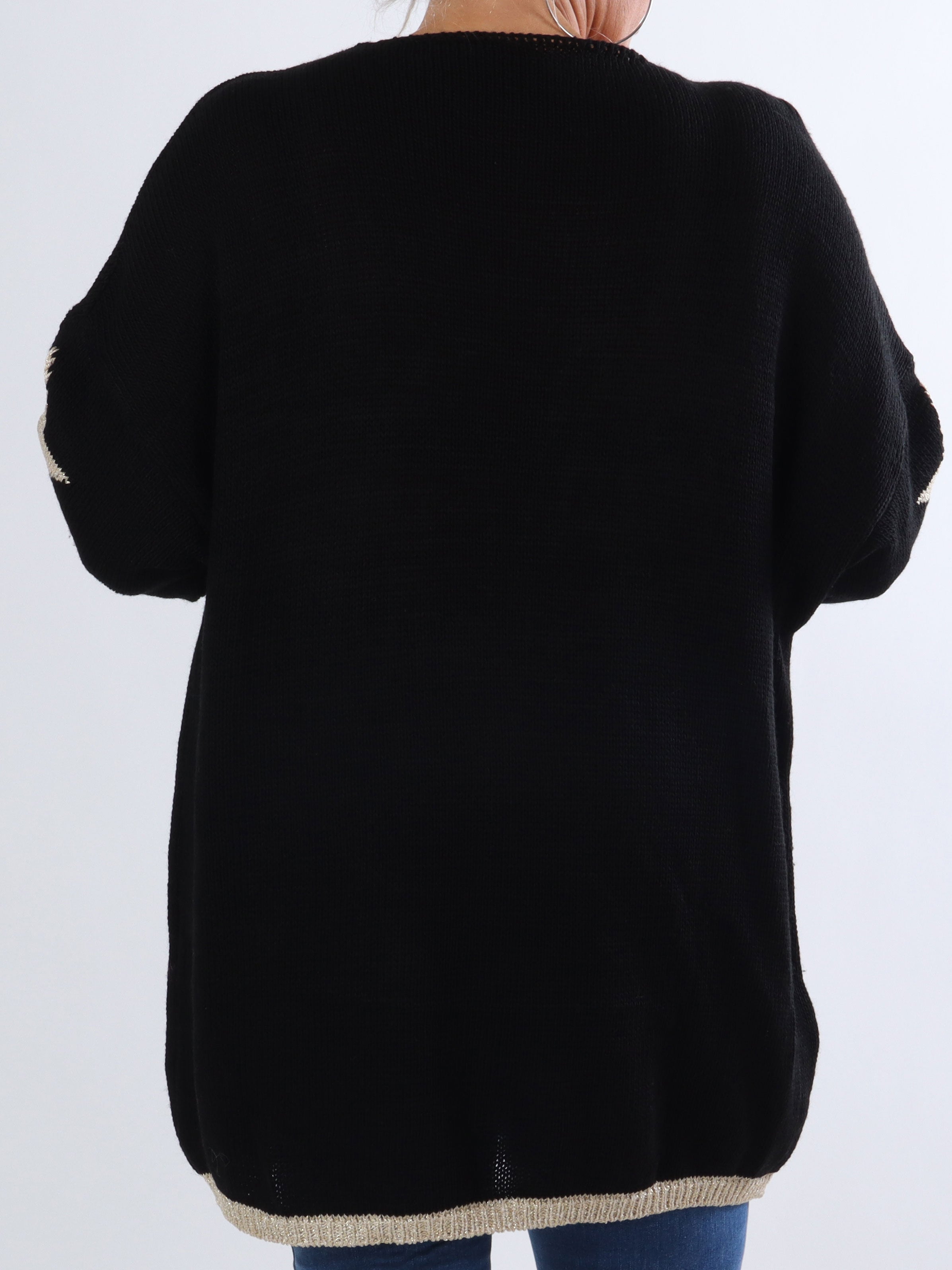 Dina - Plus size stickad med guldstjärnor